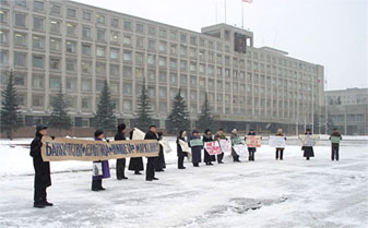 The leaders of social movements were forced to organize an unsanctioned picket (due to the lack of time) on December 20 opposite the Government House with about 30 people. Some organizers and participants of the picket were brought to administrative penalty. The posters had the following content: Putin! Take Markelov away!, Bankruptcy + Unemployment + Poverty = Markelov!, No despotism of power!, Central  Executive Committee of Russia! Cancel the results of the elections!, Year 2005  without Markelov